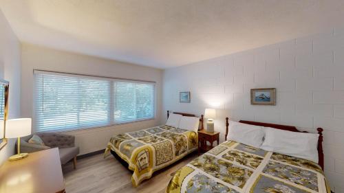 En eller flere senge i et værelse på Atlantic Breeze #2