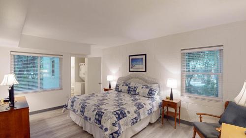 En eller flere senge i et værelse på Atlantic Breeze #4