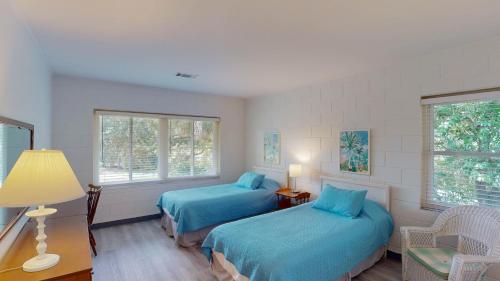 En eller flere senge i et værelse på Atlantic Breeze #5