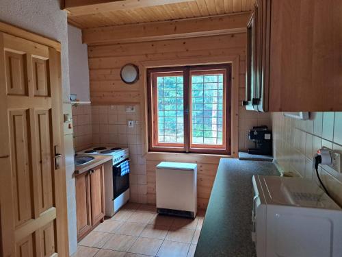 Η κουζίνα ή μικρή κουζίνα στο Chata Pod Dlhou malá Podbanské