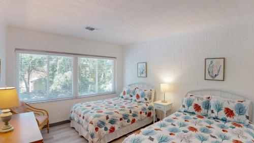 En eller flere senge i et værelse på Atlantic Breeze #6