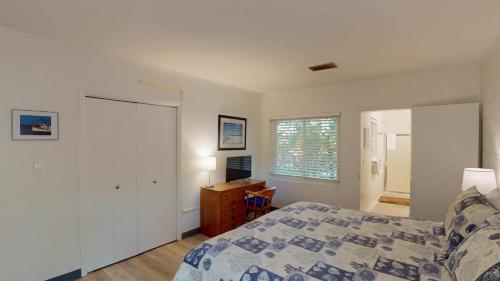 En eller flere senge i et værelse på Atlantic Breeze #8