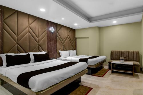 Ένα ή περισσότερα κρεβάτια σε δωμάτιο στο Hotel O KOLKATA SEVEN INN LLP