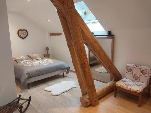 Ένα ή περισσότερα κρεβάτια σε δωμάτιο στο La Grange