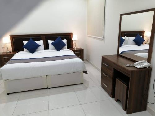 Postel nebo postele na pokoji v ubytování فندق نجمه الشمس