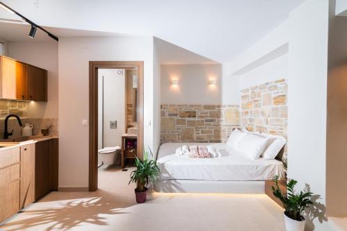 Una cama o camas en una habitación de Gemini Resort