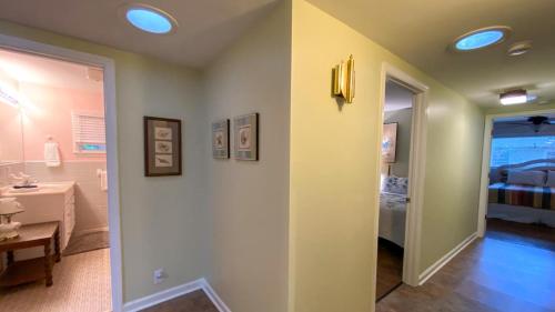 a hallway with a room with a bedroom at Very Nice Cottage in Jekyll Island