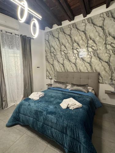 Ένα ή περισσότερα κρεβάτια σε δωμάτιο στο Shamà rooms