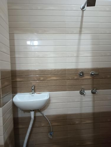 Koupelna v ubytování Shri shyam place