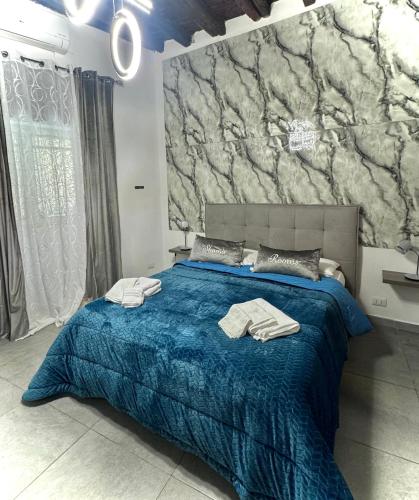 Ένα ή περισσότερα κρεβάτια σε δωμάτιο στο Shamà rooms