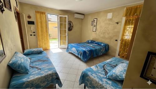 Ένα ή περισσότερα κρεβάτια σε δωμάτιο στο Hotel Wega