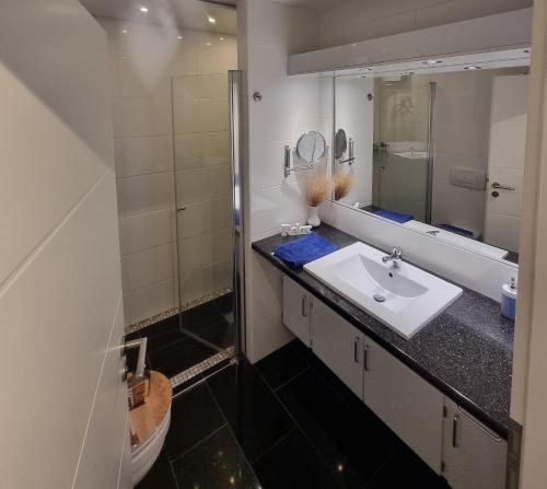 Ένα μπάνιο στο Appartement 103 Seeseite