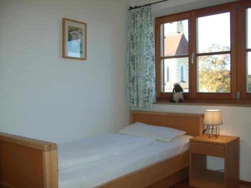 Ένα ή περισσότερα κρεβάτια σε δωμάτιο στο Agelbauer