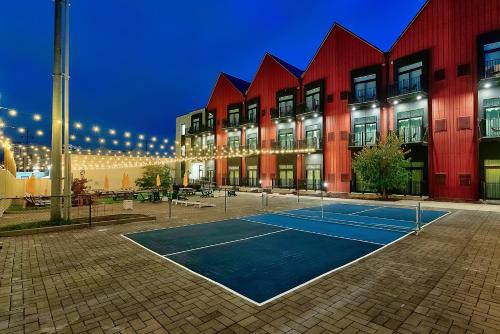 a tennis court in front of a building at The Soundry in Nashville