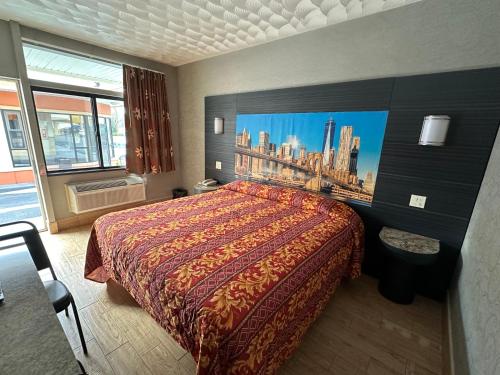 Postel nebo postele na pokoji v ubytování Apple Motel