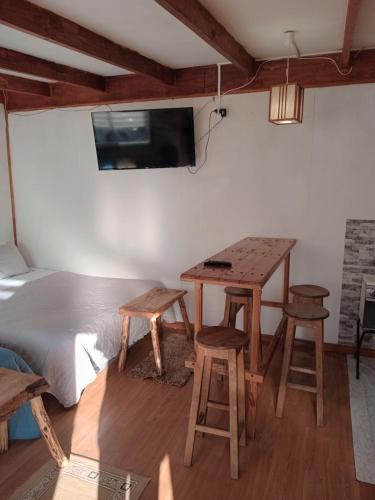 TV a/nebo společenská místnost v ubytování Hostal Costa patagonica