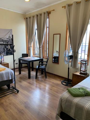 Postel nebo postele na pokoji v ubytování Valparaíso Plan, cercano al Congreso Nacional