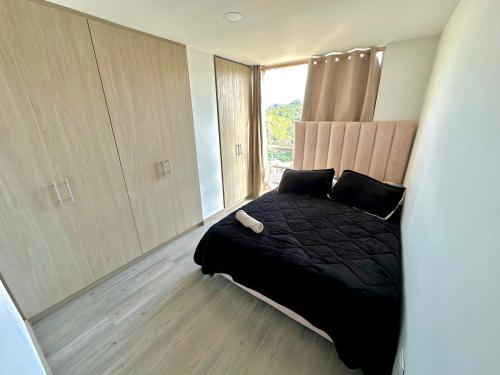 Postel nebo postele na pokoji v ubytování Acogedor y elegante apto central Urban