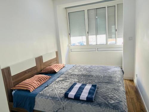 Postel nebo postele na pokoji v ubytování Guesthouse in Queluz Belas