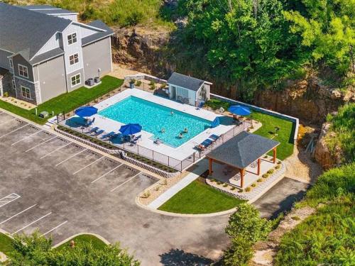 an aerial view of a house with a swimming pool at Crossroads Vistas - 3BDR Condo in Branson