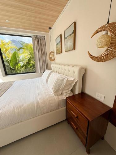 Postel nebo postele na pokoji v ubytování Calalun