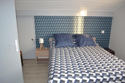 Ένα ή περισσότερα κρεβάτια σε δωμάτιο στο maison 3 classée étoiles à,proximité de Contis Plage