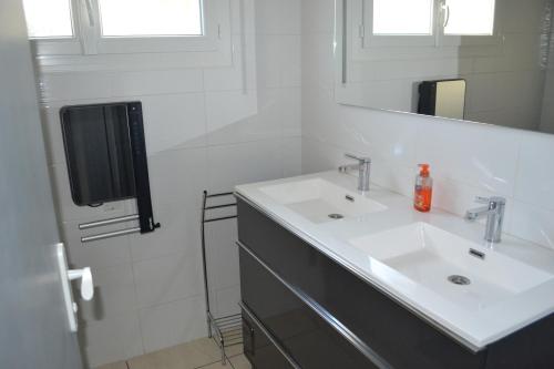 Ένα μπάνιο στο maison 3 classée étoiles à,proximité de Contis Plage