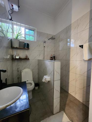 Koupelna v ubytování Gena homes bnb