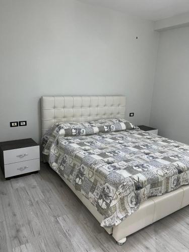 Postel nebo postele na pokoji v ubytování Dori's apartament