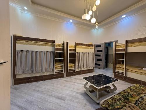 Ένα ή περισσότερα κρεβάτια σε δωμάτιο στο Caspian Hostel