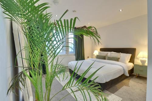 En eller flere senge i et værelse på Chapel hideaway