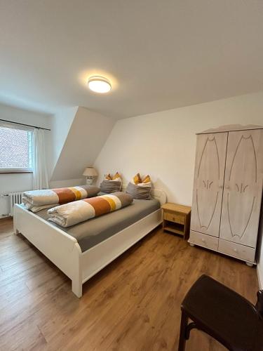 a bedroom with a large bed in a room at Ferienwohnung Maja in Waldkirch