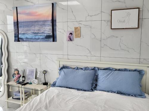 Postel nebo postele na pokoji v ubytování 바다소리 Ocean view