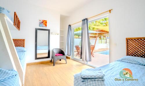 Un pat sau paturi într-o cameră la Villa Los Delfines 2