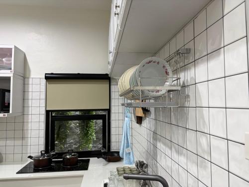 Η κουζίνα ή μικρή κουζίνα στο Ama'home