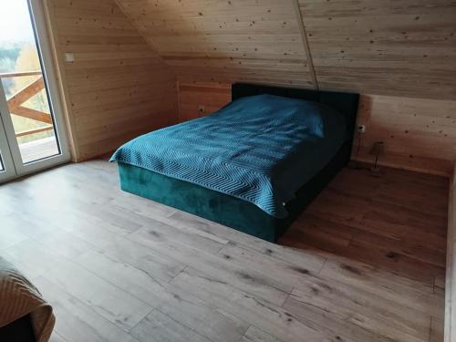 Postel nebo postele na pokoji v ubytování Gruszchatka