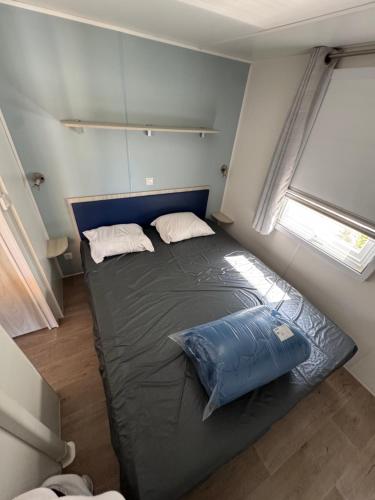 Ένα ή περισσότερα κρεβάτια σε δωμάτιο στο Mobil home