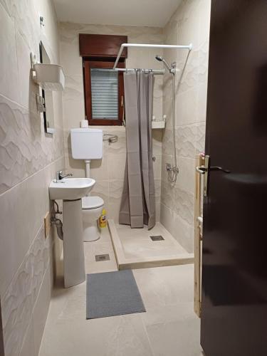 Koupelna v ubytování Marele