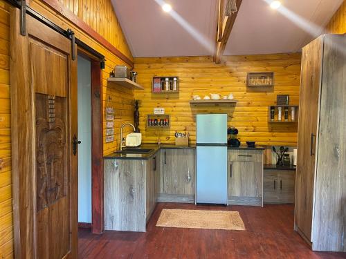 Kuchyň nebo kuchyňský kout v ubytování Heart Of The Cosmos