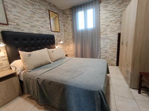 Postel nebo postele na pokoji v ubytování ESTUDIO FAMILIAR En EZCARAY