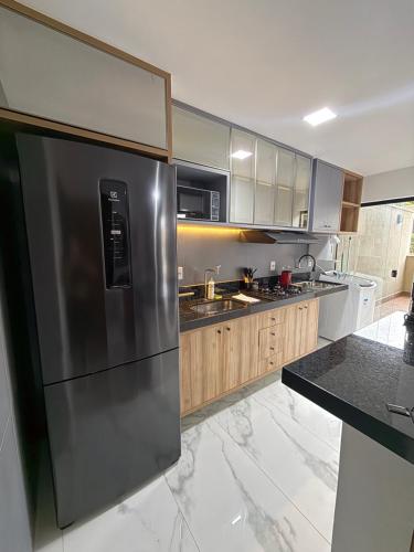 Køkken eller tekøkken på Apartamento novo e completo