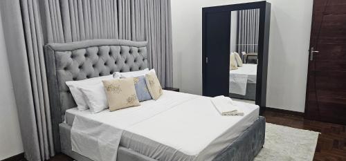 Un pat sau paturi într-o cameră la La Casa Modesta