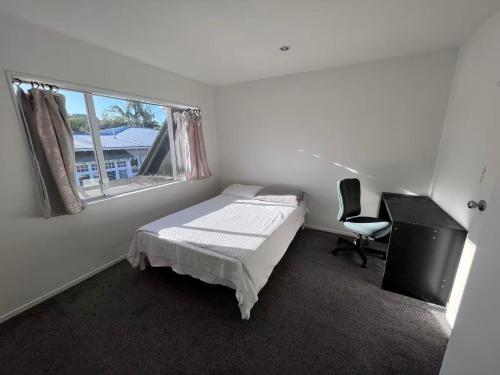 Postel nebo postele na pokoji v ubytování Epsom House close to CBD