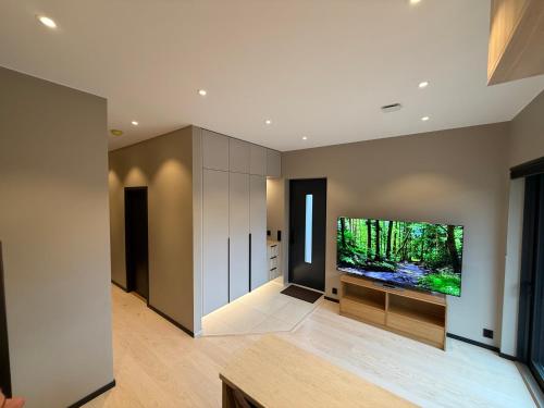 Ένα ή περισσότερα κρεβάτια σε δωμάτιο στο Modern apartment near Gardermoent airport