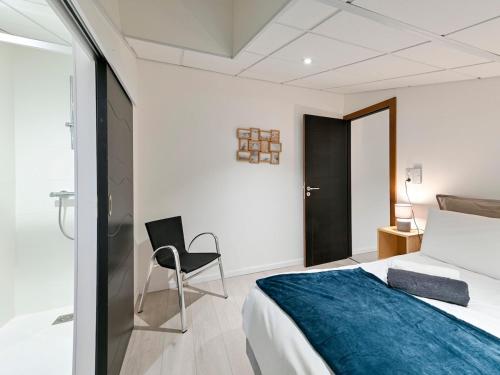 Ένα ή περισσότερα κρεβάτια σε δωμάτιο στο La Tiboire Côté Grange - Authenticité & Elégance