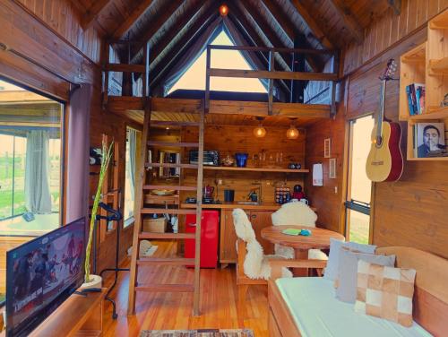 Kuchyň nebo kuchyňský kout v ubytování Chalé na Pousada Eco das Aves próximo a vinícola Thera