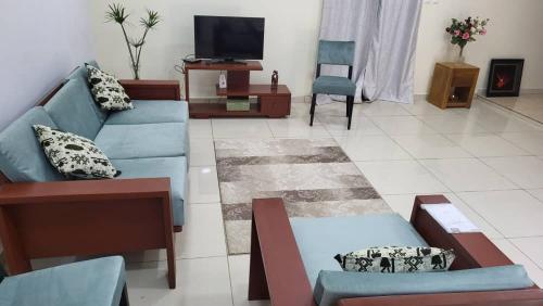 Un televizor și/sau centru de divertisment la DoRa Apparts