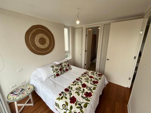 Ένα ή περισσότερα κρεβάτια σε δωμάτιο στο Moderno departamento Montemar Concón 1D 1B