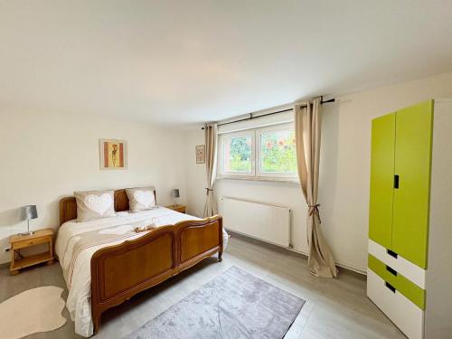 Ένα ή περισσότερα κρεβάτια σε δωμάτιο στο Le Mazal