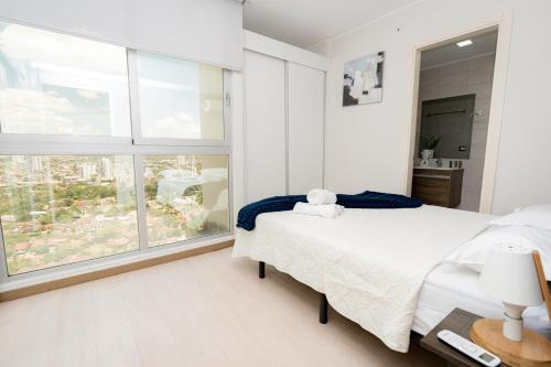 Postel nebo postele na pokoji v ubytování Boutique Apartments Panamá Coco del Mar